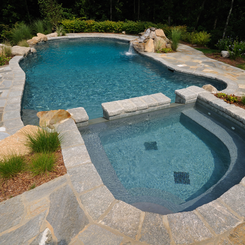 custom gunite pool with stone and landscaping